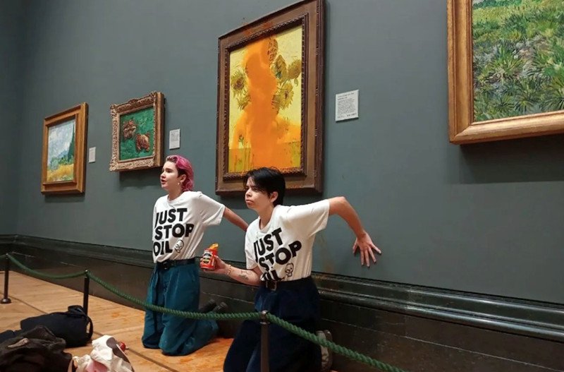 Vincent van Gogh’s painting ‘Sunflowers’ splashed with tomato soup by protesters